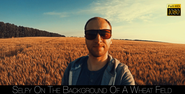 Selfy On The Background Of A Wheat Field Selfy On The Background Of A Wheat Field