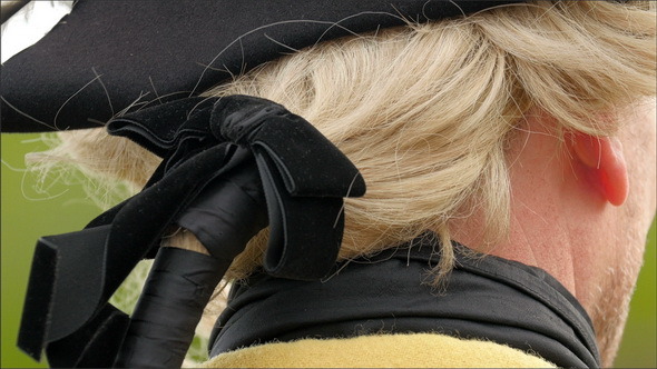 The Back of the Head of the Guard
