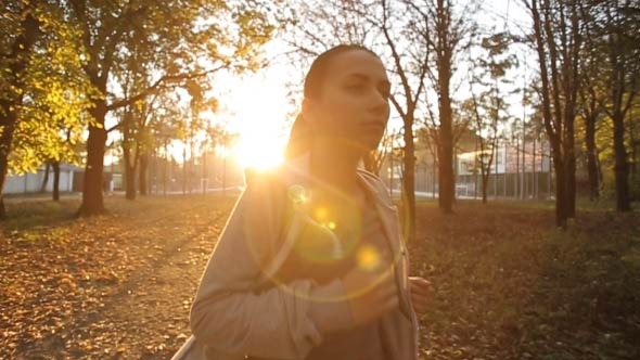 Woman Runs At Sunset Woman Runs At Sunset