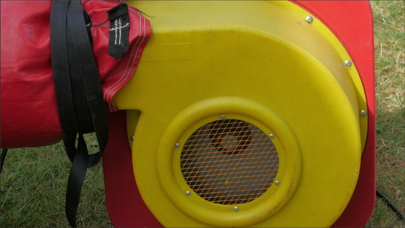 A Red Blower Used to Inflate the Zorb Ball