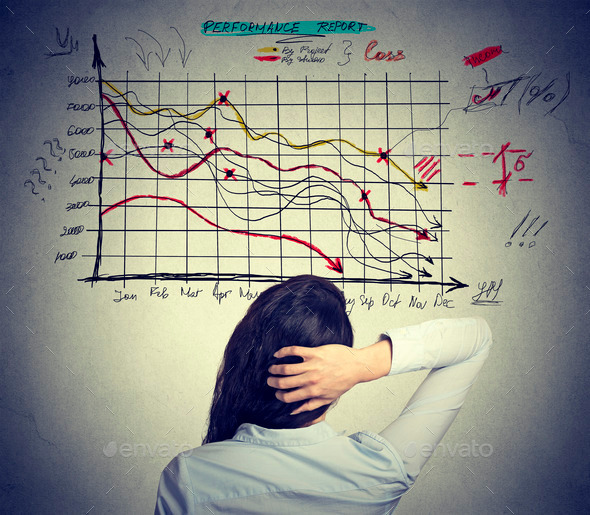 Woman analyst solving bad economy problem. Stressful business life