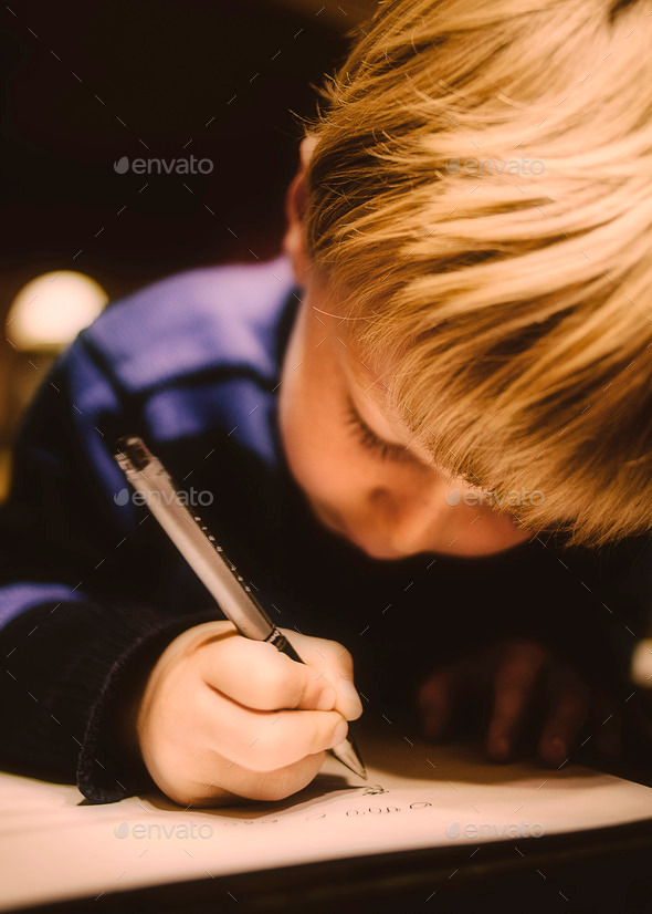 Little Boy Writing - Stock Photo - Images
