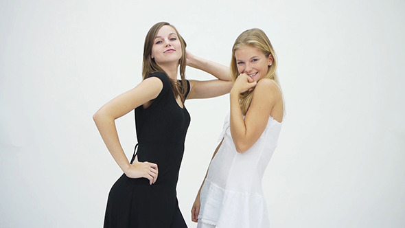 Two Young Girls In White And Black Dress
