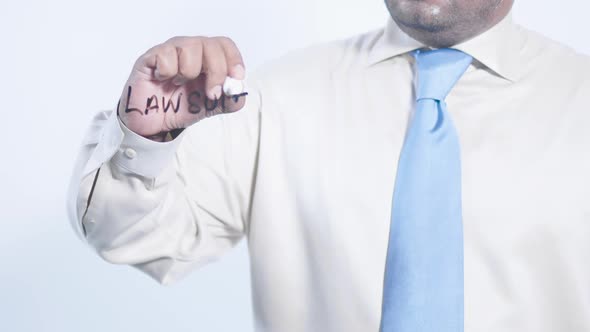 Asian Businessman Writes Law Suit 