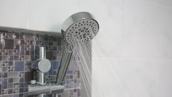 Modern Shower Head In Bathroom Spray Water alt