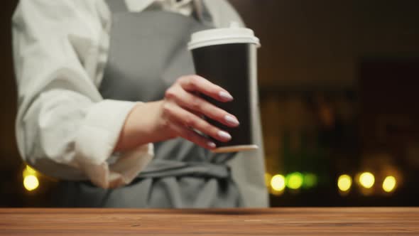 Buying Coffee or Tea and Paying By Cash Closeup alt