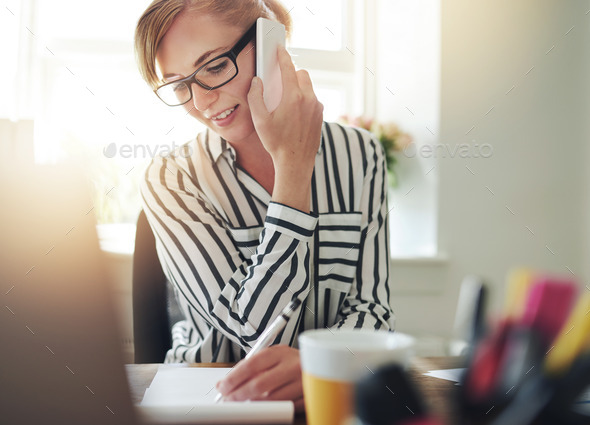 Successful self-employed young woman - Stock Photo - Images