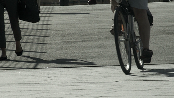 Pedestrians and Bike on a Sidewalk