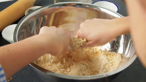 Chef or Baker Making Dough at Bakery alt