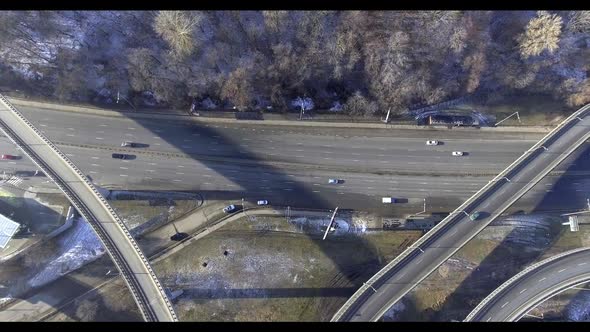  Footage Road Transport Interchange Near the Winter Forest. alt