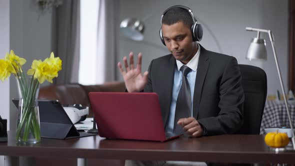 Camera Goes Up From Legs in Slippers and Pajama Pants to Serious African American Man in Formal Suit alt