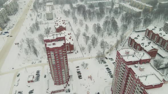 Modern Highrise Buildings Covered with Snow After a Blizzard alt