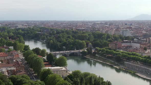 Beautiful bridge over river Po and cityscape of Turin, aerial drone view alt