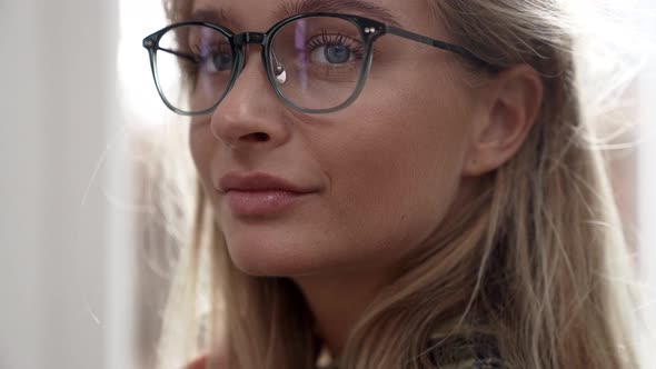 Beautiful Blond Woman In Glasses
