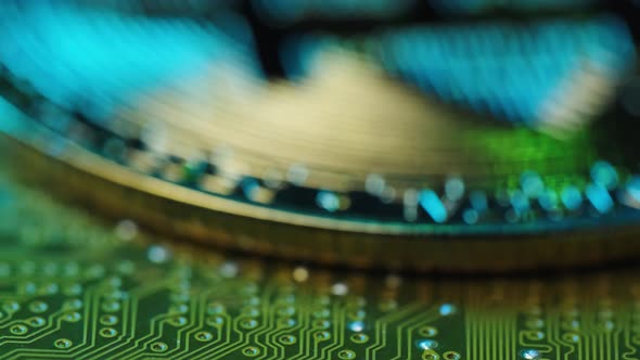 Bitcoin on Circuit board, Rack focus, Extreme close up motion, Depth of field alt