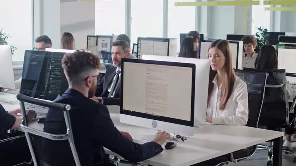 Modern Open Space Corporate Office with Tow Rows Off Businessmen and Businesswomen Working on alt