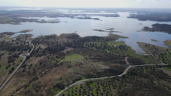 Rural lanscape on shores of Alqueva lake, Portugal. Aerial drone panoramic view alt