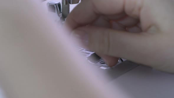Putting black thread on a sewing machine alt