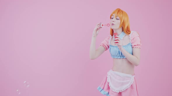 Young Cosplayer Started Modeling And Is Blowing Bubbles During Her Firs Photo Shoot Medium Long alt