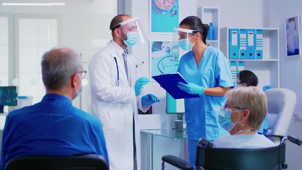 Doctor Giving Instruction About Patient Treatment alt