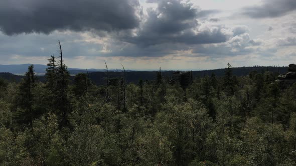 Walk through the rock blocks. Bare rocks high in the mountains. Rock town. Taken in Sto?owe Mountain alt