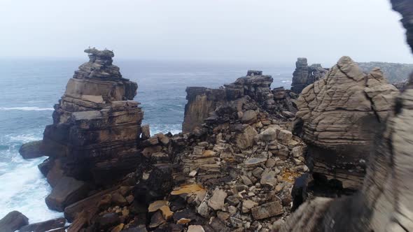 Aerial View Unusual Natural Column on Coast of Atlantic Ocean in Portugal