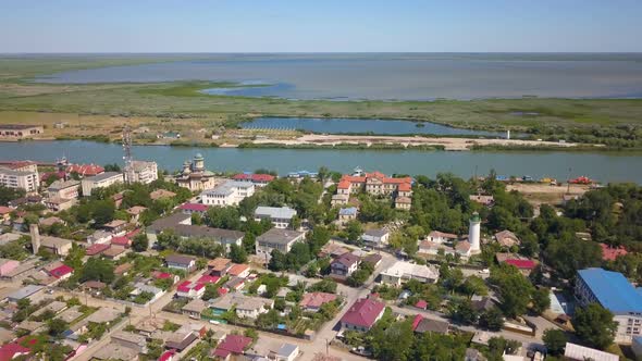 Aerial View Of Sulina City Harbor And The Danube Flowing Into The Black Sea alt