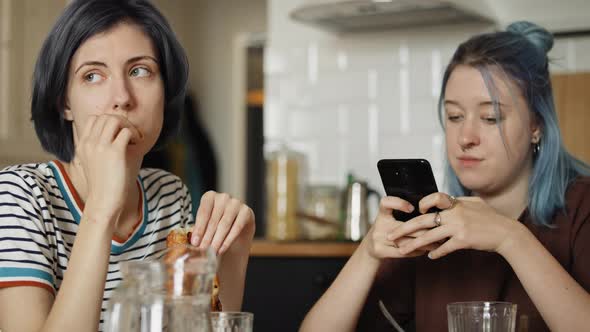 Handheld video of offended lesbians during breakfast. Shot with RED helium camera in 8K. alt