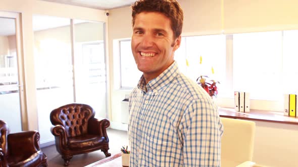 Therapist smiling in clinic alt