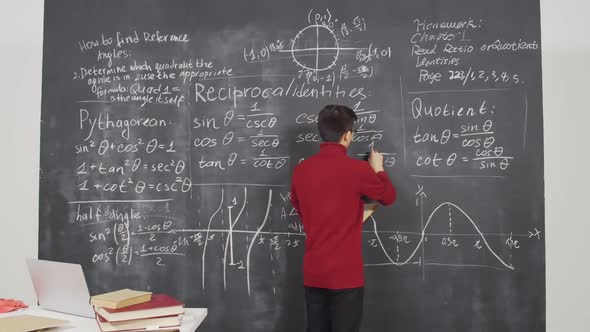 Asian Scientist Working in Classroom alt