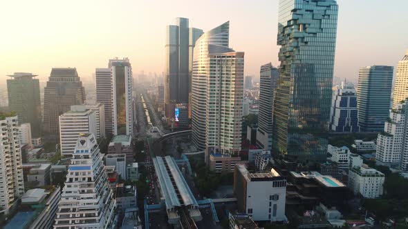 4k Aerial city view of Bangkok dowtnown, Flying over Bangkok, Thailand. alt