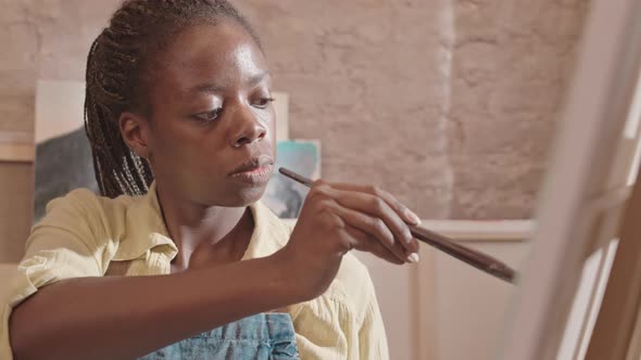 Black Woman Painting on Canvas alt