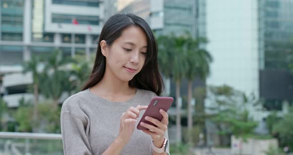 Woman Use of Mobile Phone alt