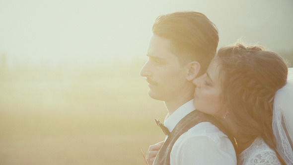 Bride Embraces Bridegroom alt