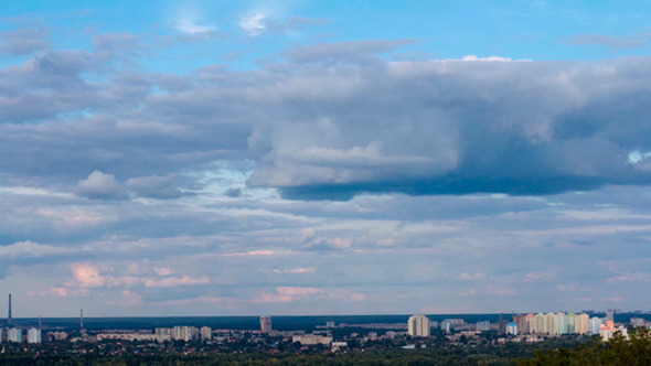 Running Clouds Over The City alt