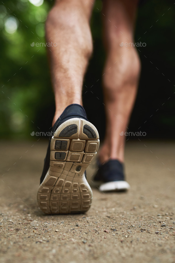 Shoe Sole of a Man Running at the Park
