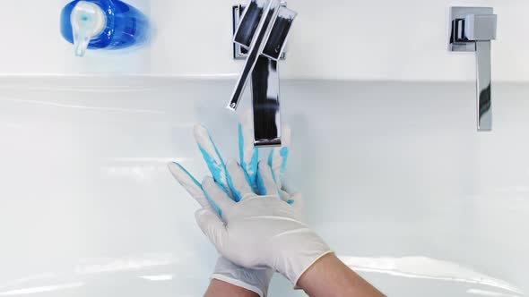 Real time video of washing hands guide with paint. Shot with RED helium camera in 8K. alt