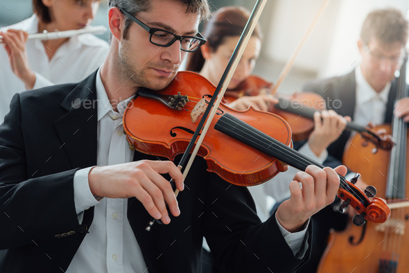 Orchestra string section performing - Stock Photo - Images