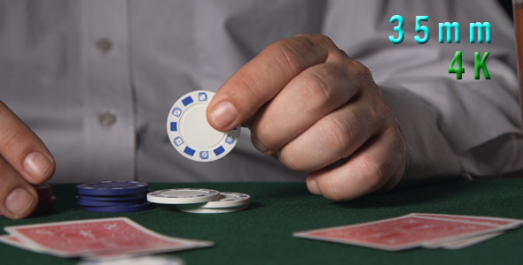Poker Player Having A Drink And Placing A Bet 32
