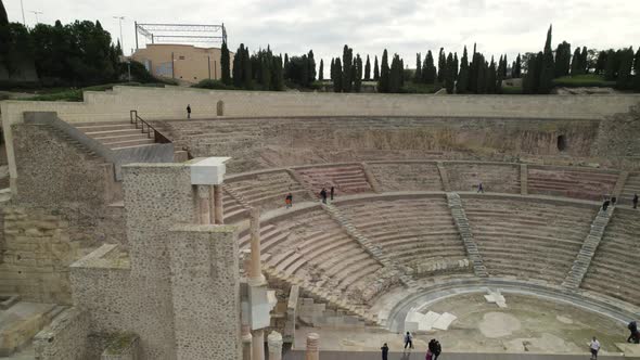 Roman amphitheater in Cartagena, Spain. Aerial circling