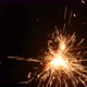 Handheld sparkle firework isolated on black. New year concept - VideoHive Item for Sale