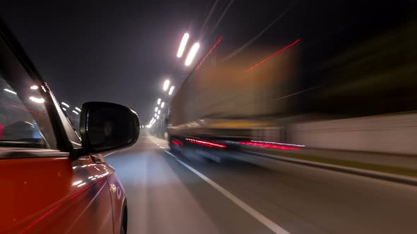 Drivelapse Urban Look From Fast Driving Car at a Night Avenue in a City Timelapse Hyperlapse alt