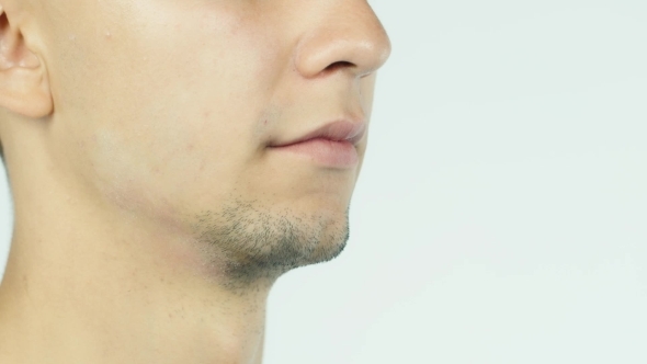 The Young Man Drinks Water From a Glass alt