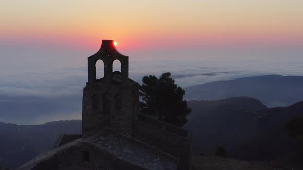 Drone Of Sun Rising Over Ruins Of Sant Pere De Rodes alt