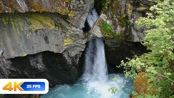 Waterfall Behind Rocks