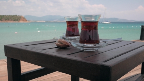 Two Glasses Of Turkish Tea On The Table With