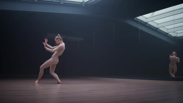 Cinematic Young Female is Doing Yoga in a Mirror Room Flexible Female Performs a Beautiful Dance alt