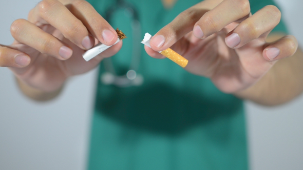 Doctor Breaking Cigarette, No Smoking alt