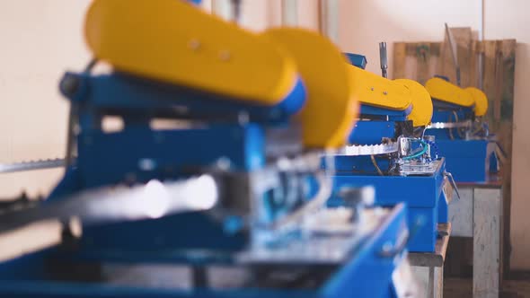 Automated Machine Tools Sharpen Band Saw Gears in Light Shop alt