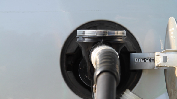 Filling Of Diesel Fuel In The Car alt
